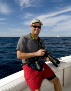 Jon with his trusty camera, ready to photograph.